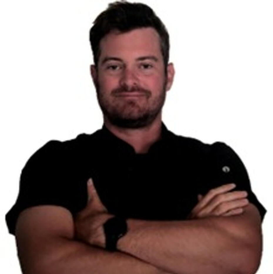 Chef Christoff van Zyl, private superyacht and estate chef wearing a black chef jacket